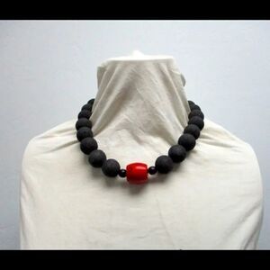 Lava stone and coral necklace
